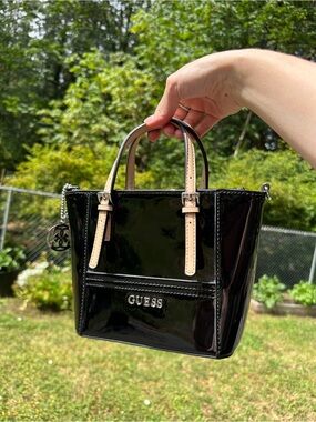 GUESS Delaney Black Patent Mini Tote Crossbody Bag Tan Strap